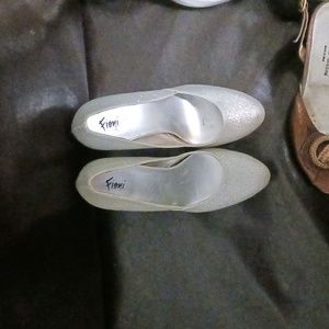 Silver colored high heels by Fioni